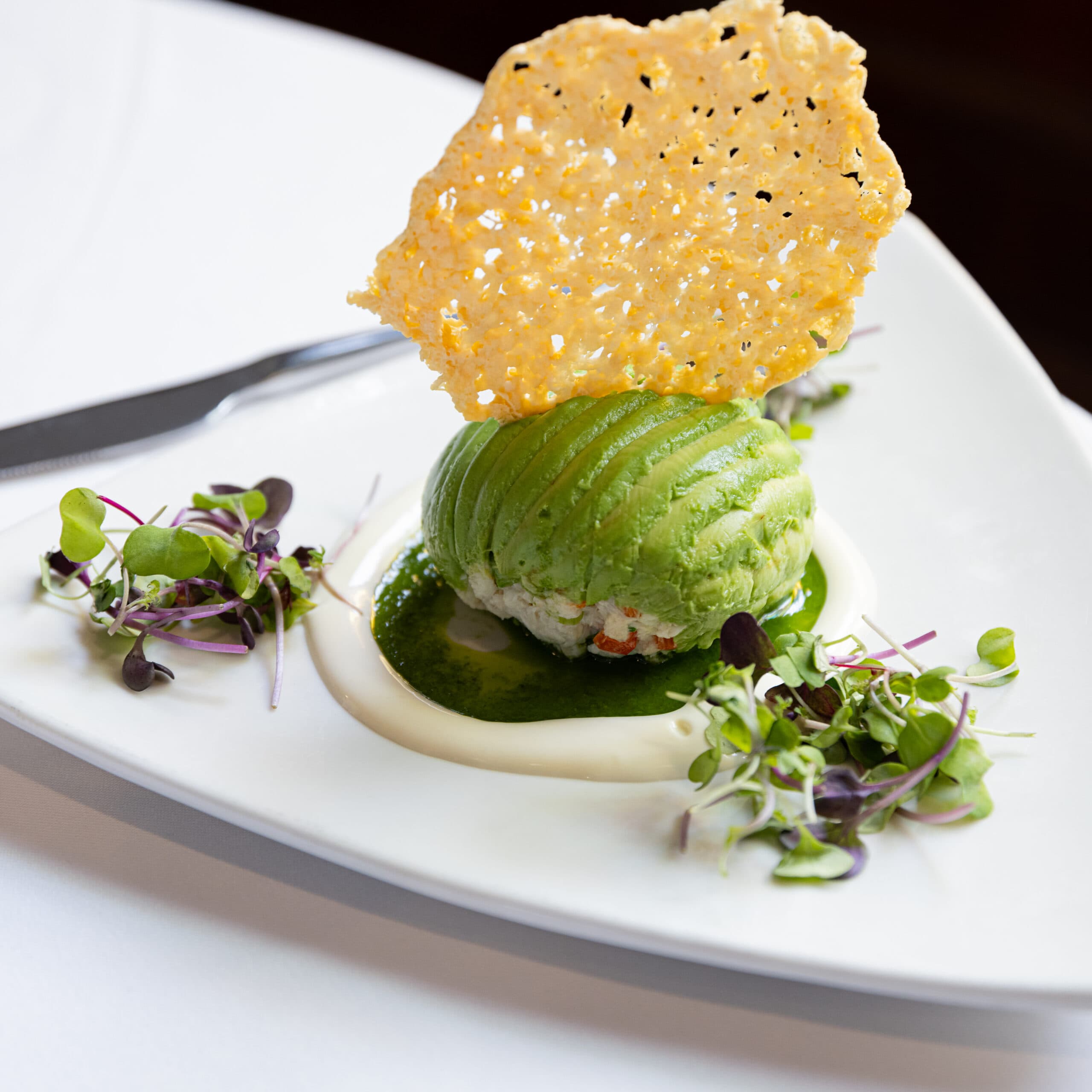 Crab avocado with a large parmesan crisp
